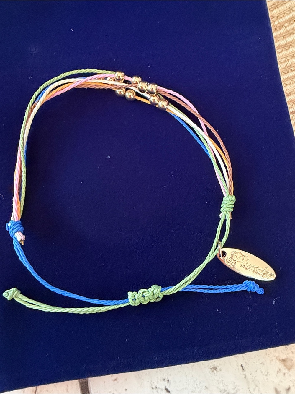 Plunder Multicolor Braided Cord Bracelet with Gold Round Beads & Logo Tag